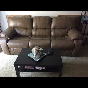 Reclining leather sofa